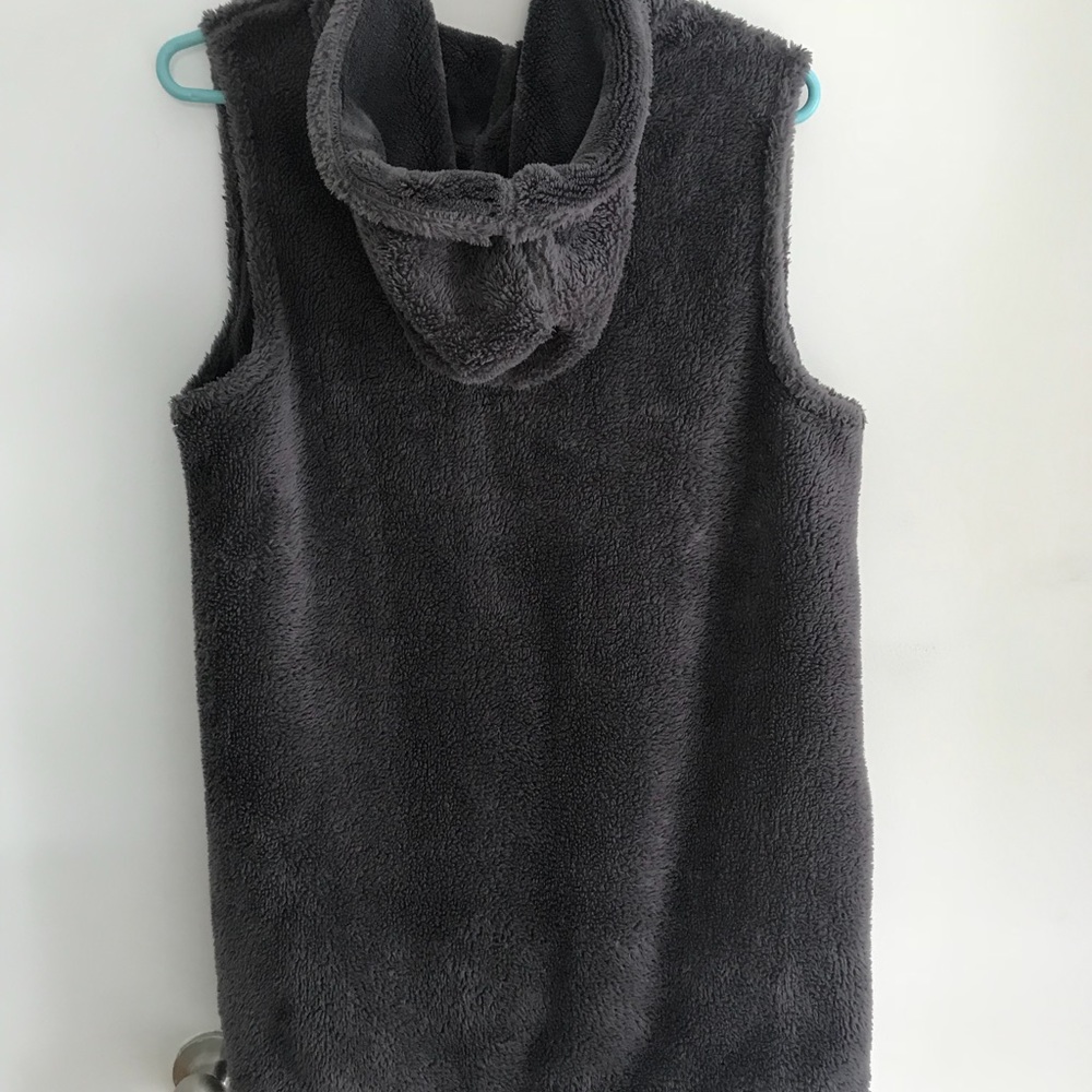 Fluffy hooded vest. Never worn.